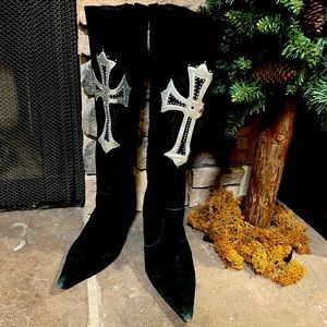 Black boots with silver crosses on them